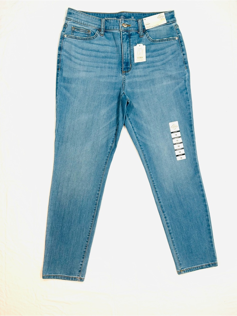 NWT St. John’s Bay Mid Rise Skinny Leg Jeans